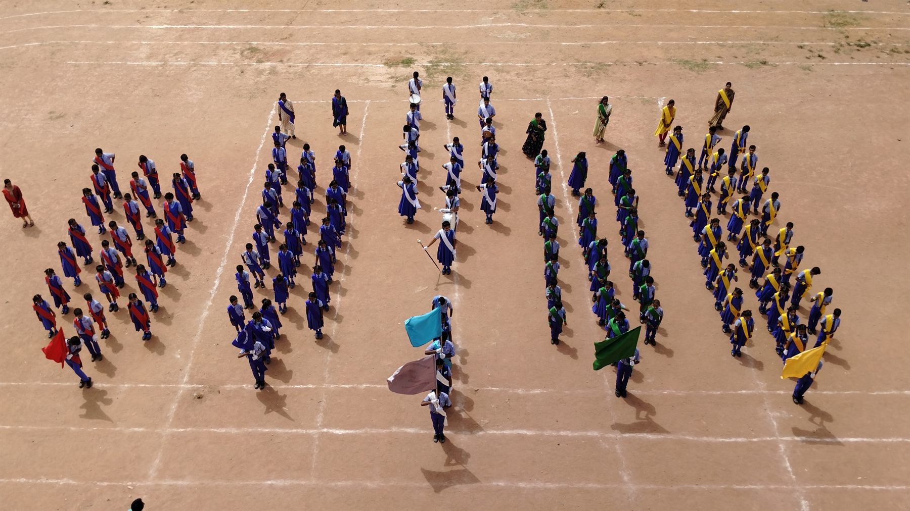 Students participating in a school formation activity at TS TPS